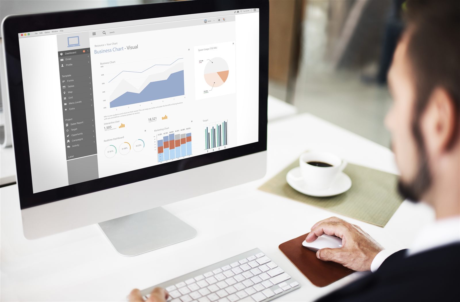 Specialist monitoring business dashboards during Dynamics 365 production preparation
